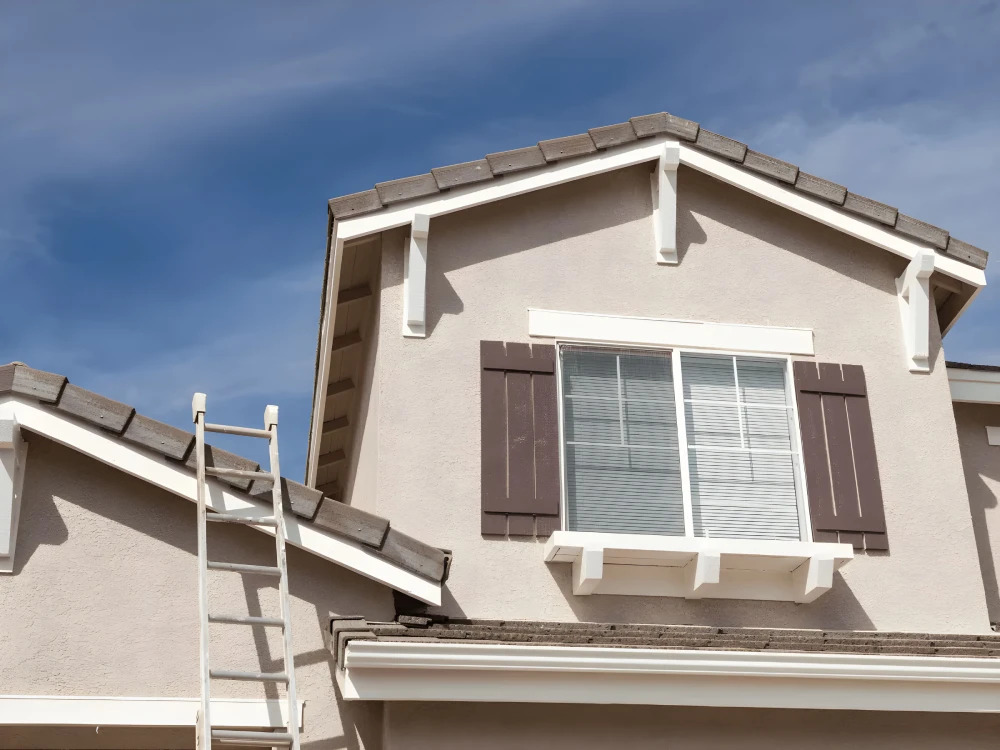 How Roof Painting in Ormond Beach Extends the Life of Homes